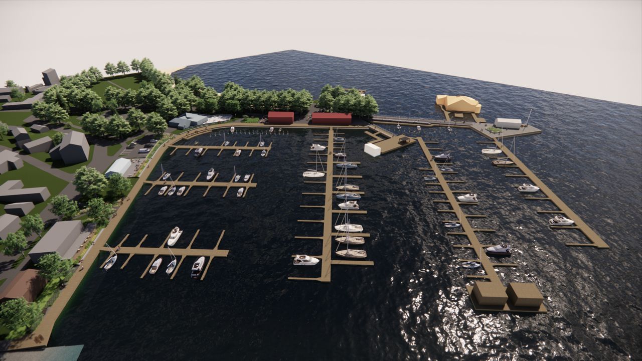 Flygvy över planerade Norra hamnen med nya bryggor och båtplatser